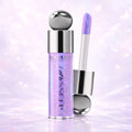 Gloss up! Lip gloss with applicator on a purple background
