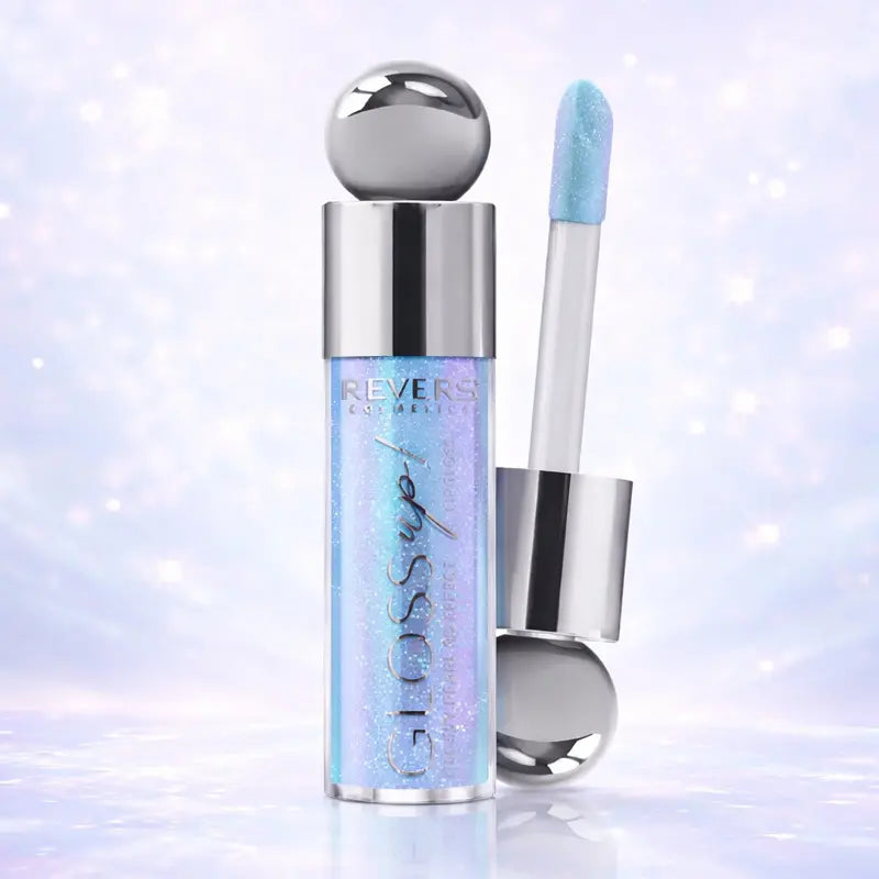 Gloss up! Lip gloss with applicator on a sparkling background