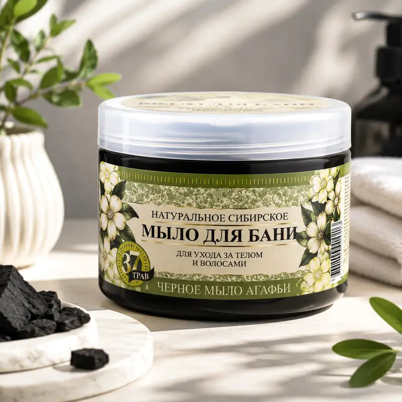 Jar of natural Siberian Grandma Agafia Black Soap with decorative elements on a light background