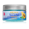 Jar of Aroma Ritual tropical body scrub with papaya and mint on a white background