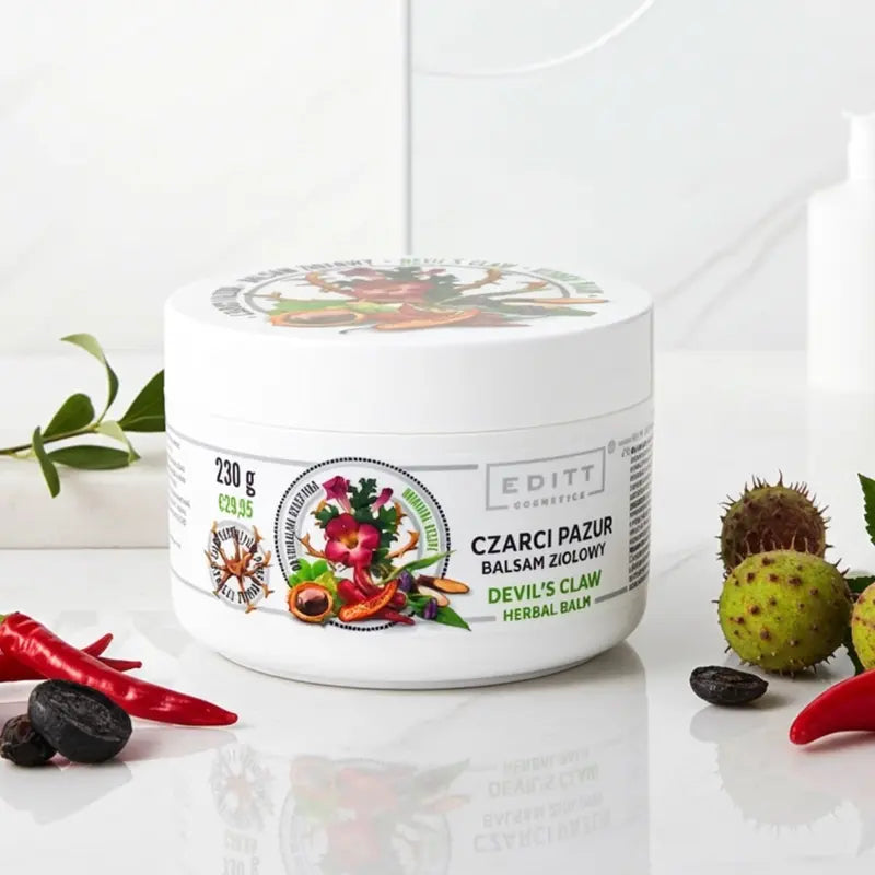 Jar of 'Devil's Claw Herbal Balm' with natural elements on a white background